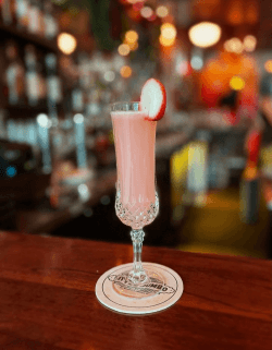 Picture of pink mocktail sitting on bar at Little Jumbo Picture of pink mocktail sitting on bar at Little Jumbo