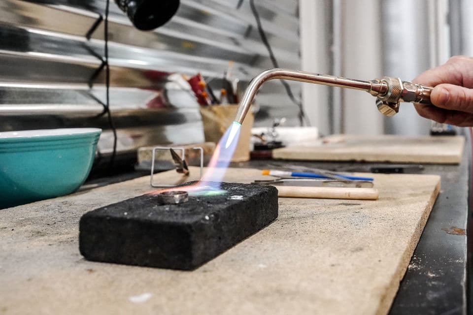 Using a torch at Ignite's downtown location Using a torch at Ignite's downtown location