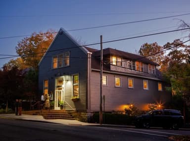 25% off bottles of wine at Tall John's