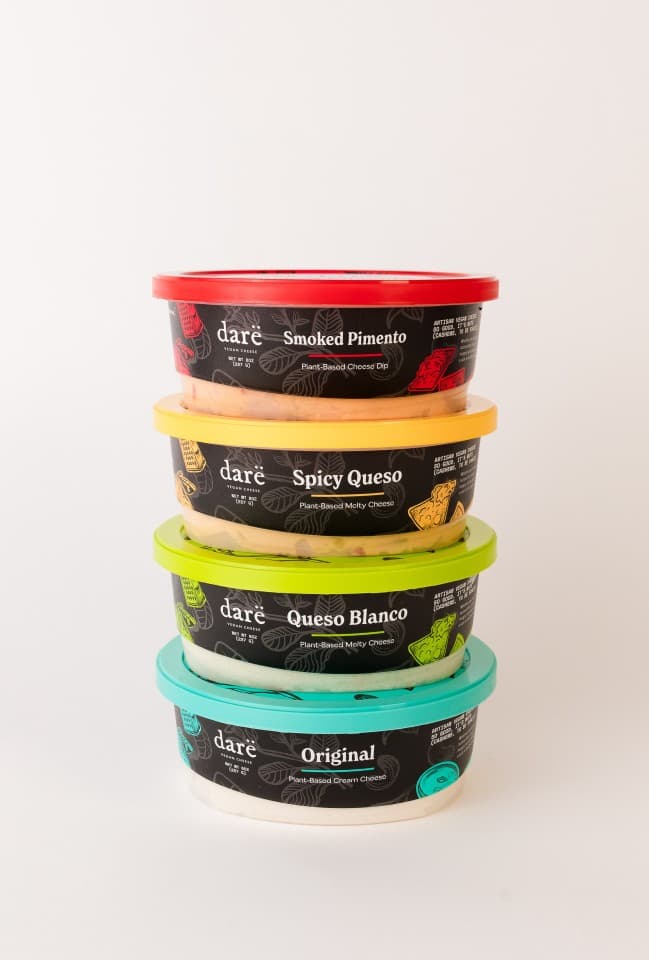 Four dips and spreads stacked from Darë Vegan Cheese Four dips and spreads stacked from Darë Vegan Cheese