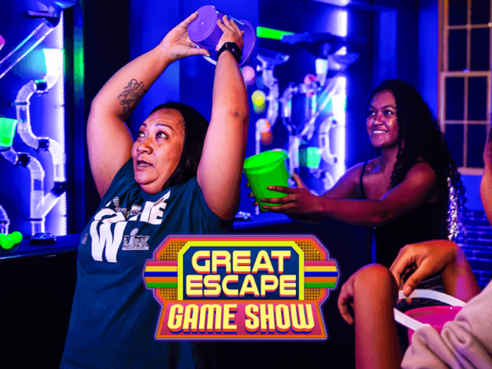 Great Escape Game Show is now live with the best game show experience to Asheville, North Carolina. Each round of our game show features a different fun mini-game. Our line-up of rotating mini-games includes trivia, quick-thinking strategy, speed tests, and more! Book your live game show experience today! Great Escape Game Show is now live with the best game show experience to Asheville, North Carolina. Each round of our game show features a different fun mini-game. Our line-up of rotating mini-games includes trivia, quick-thinking strategy, speed tests, and more! Book your live game show experience today!