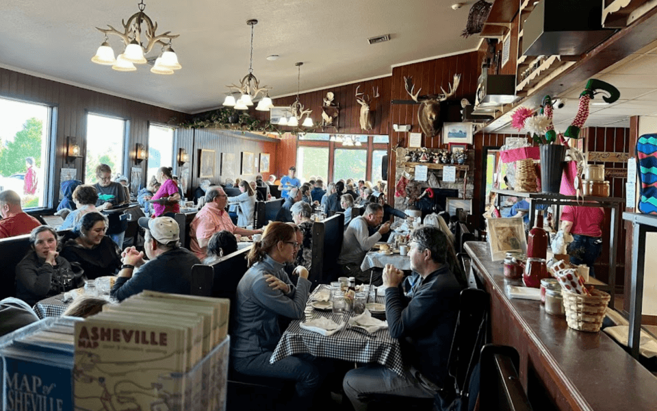 Enjoy your meal at this cozy Asheville restaurant with a mountain view! Enjoy your meal at this cozy Asheville restaurant with a mountain view!