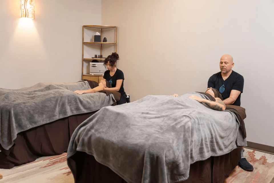 Experience the benefits of a world-class Esalen® Massage side-by-side with someone you love. Receiving a professional couples massage is a wonderful way to celebrate your relationship. It's not reserved just for romantic partners, often times good friends or family members use a shared massage experience to deepen their connection and bond with one another. You may choose to use your time to talk with one another, relax with music or appreciate the shared silence. Experience the benefits of a world-class Esalen® Massage side-by-side with someone you love. Receiving a professional couples massage is a wonderful way to celebrate your relationship. It's not reserved just for romantic partners, often times good friends or family members use a shared massage experience to deepen their connection and bond with one another. You may choose to use your time to talk with one another, relax with music or appreciate the shared silence.
