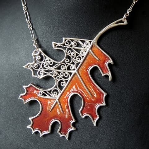 Argentium Silver leaf with torch fired enamel and filigree accents. Argentium Silver leaf with torch fired enamel and filigree accents.