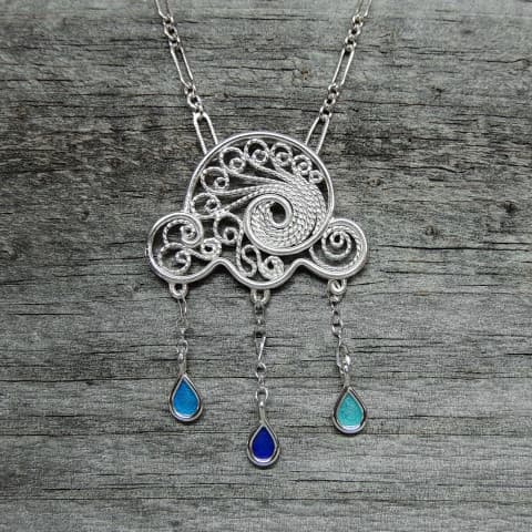 Argentium Silver filigree with torch fired enamel raindrops. Argentium Silver filigree with torch fired enamel raindrops.