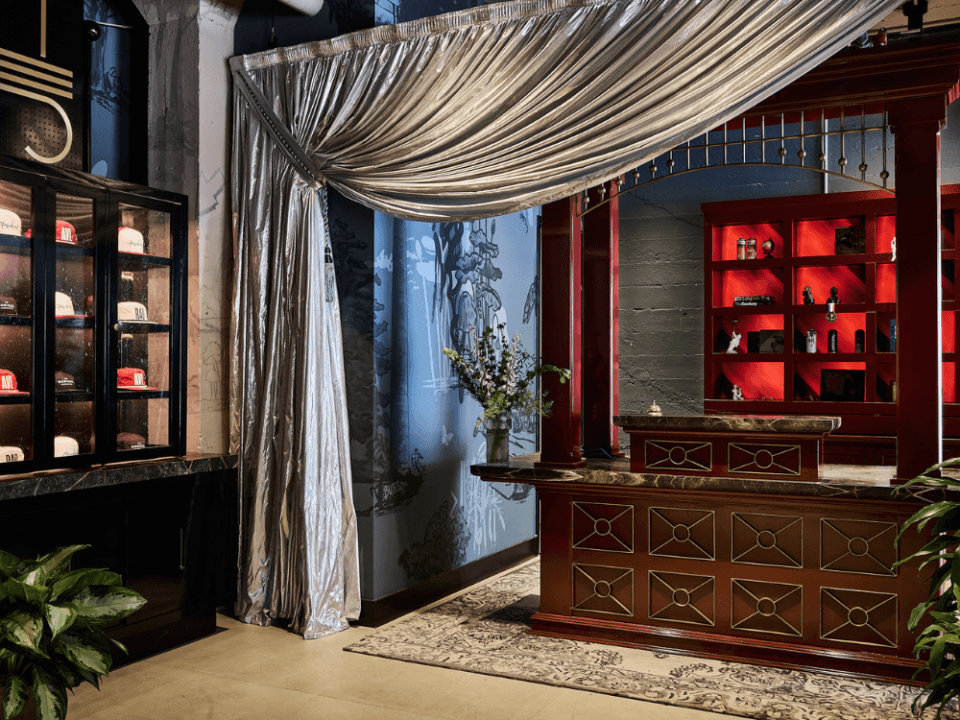 front desk with silver curtain pulled back front desk with silver curtain pulled back