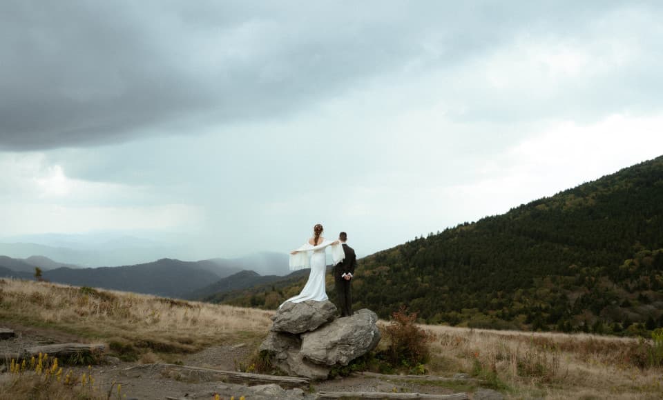 A couple eloping in the mountains of Asheville, North Carolina. A couple eloping in the mountains of Asheville, North Carolina.
