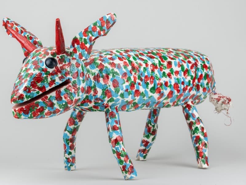 J. L. Nippers, "Critter," circa 1985, cedar wood, oil paint, rope, glass marble, 12 × 23 × 13 ½ inches. Asheville Art Museum. Gift of Dr. and Mrs. A. Everette James, Jr. © J. L. Nippers. J. L. Nippers, "Critter," circa 1985, cedar wood, oil paint, rope, glass marble, 12 × 23 × 13 ½ inches. Asheville Art Museum. Gift of Dr. and Mrs. A. Everette James, Jr. © J. L. Nippers.