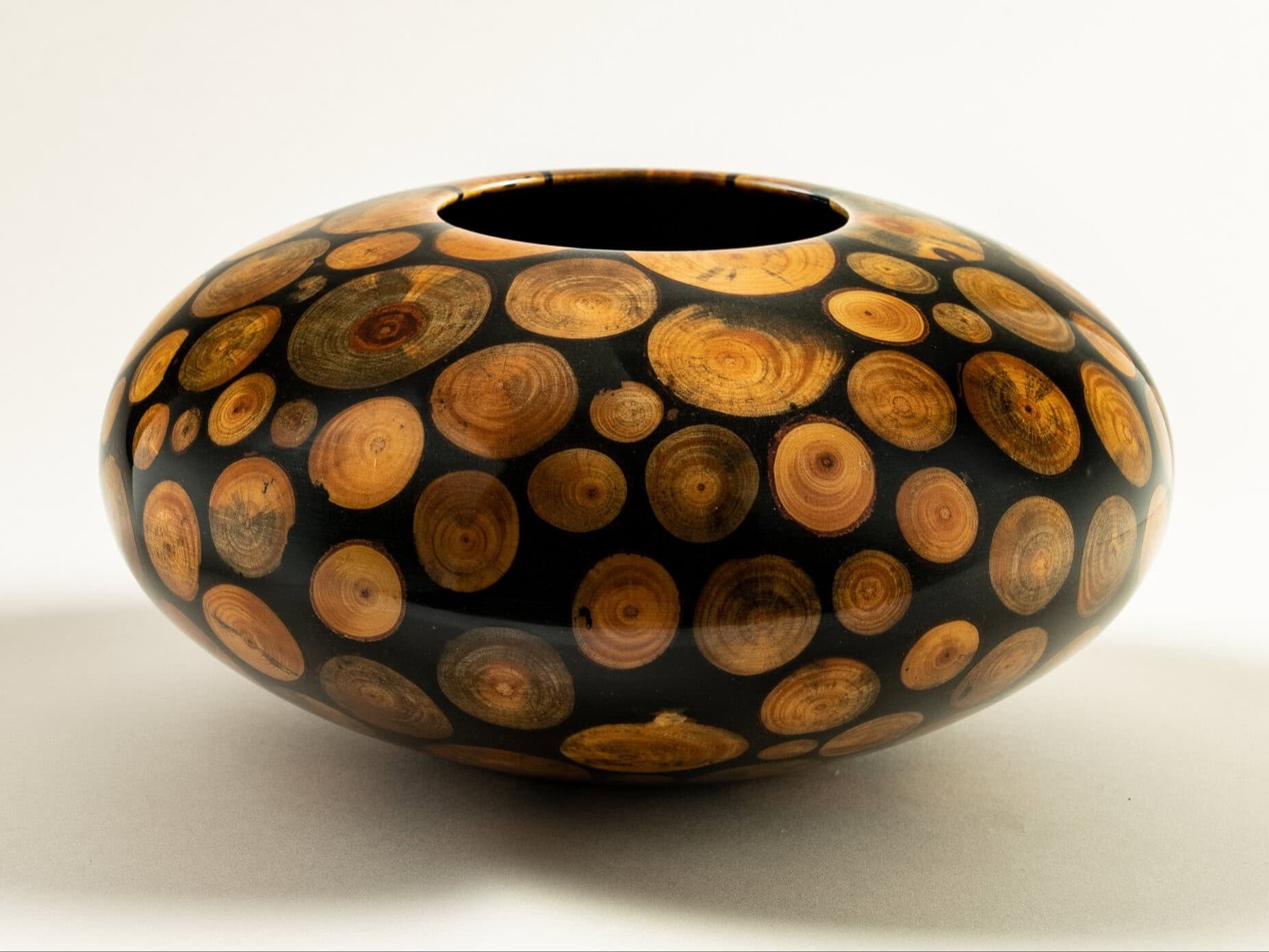 Philip Moulthrop, "Mosaic Pattern Vessel", circa 1993–1995, white pine mosaic and epoxy, 6 ¼ × 11 inches. Gift of Fleur S. Bresler, Asheville Art Museum. Philip Moulthrop, "Mosaic Pattern Vessel", circa 1993–1995, white pine mosaic and epoxy, 6 ¼ × 11 inches. Gift of Fleur S. Bresler, Asheville Art Museum.