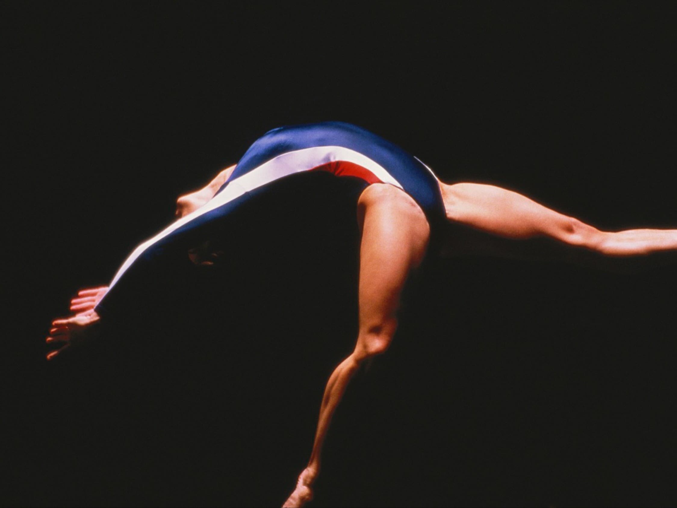 Walter Iooss Jr., "Gymnast, L.A.", 1983 (printed 2018), archival pigment print on paper, 20 × 24 inches. Gift of Michael Moses, Asheville Art Museum Walter Iooss Jr., "Gymnast, L.A.", 1983 (printed 2018), archival pigment print on paper, 20 × 24 inches. Gift of Michael Moses, Asheville Art Museum