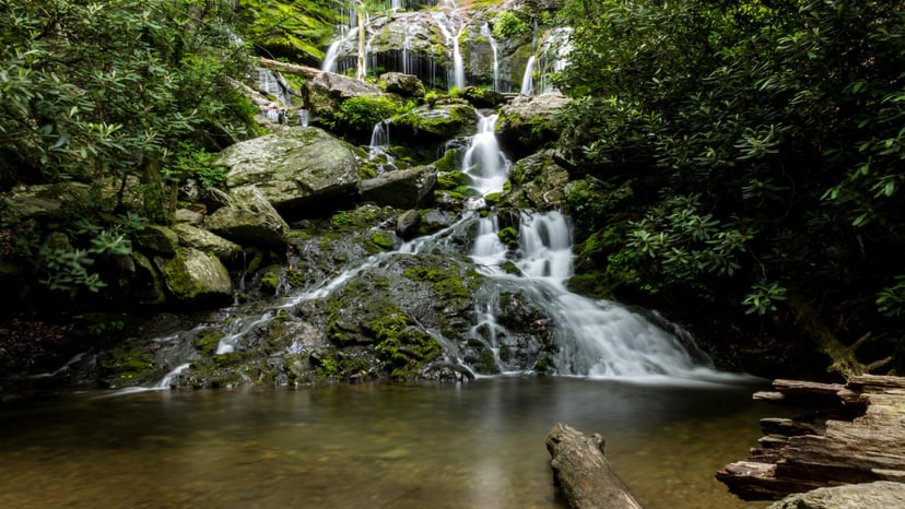The cascade of Catawba Falls flows into a pond in Asheville