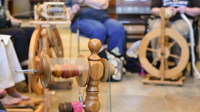 Wood equipment to spin yarn in a fiber arts workshop in Asheville