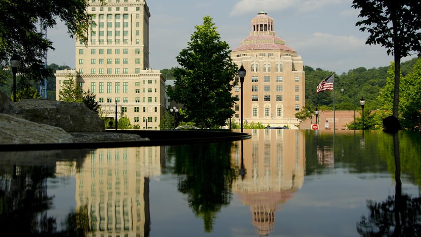 Beautiful Asheville architecture is reflected in a fountain